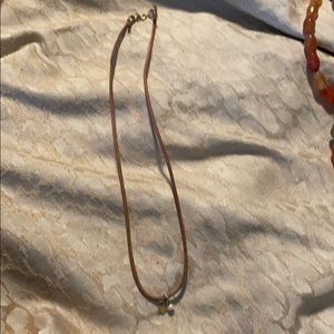 Leather necklace with small charms